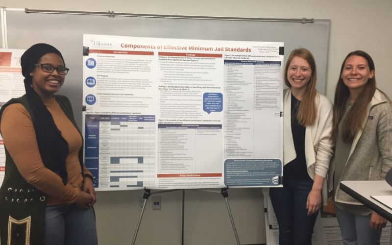 photo of students presenting at the conference.